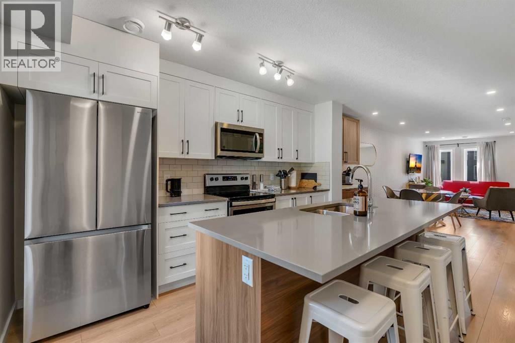 312, 19500 37 Street Se, Calgary, Alberta  T3M 2W9 - Photo 1 - A2301249