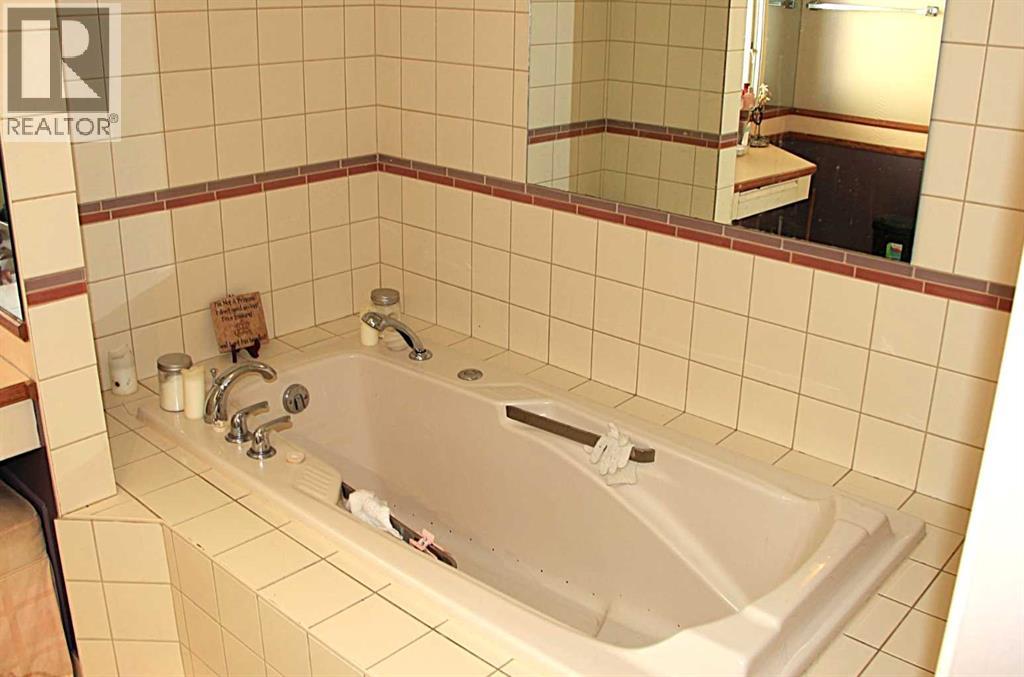 20 Bedwood Hill Ne, Calgary, Alberta  T3K 1L9 - Photo 15 - A2284854