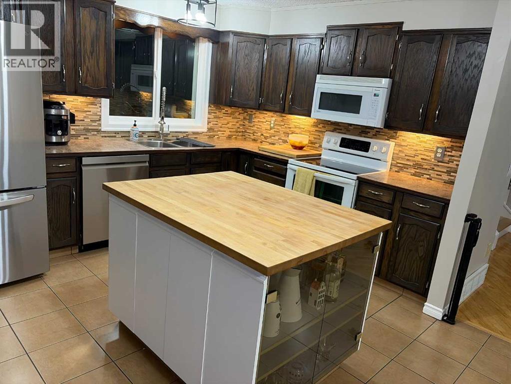 391 Scenic Glen Place NW, Calgary, Alberta  T3L 1J5 - Photo 8 - A2299314