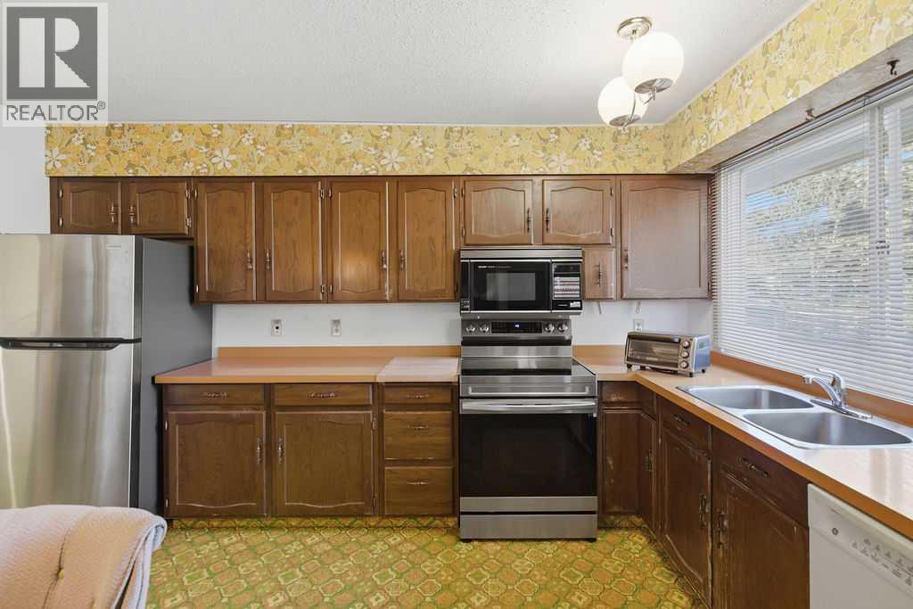 5516 Dalhart Hill Nw, Calgary, Alberta  T3A 1S9 - Photo 17 - A2285431