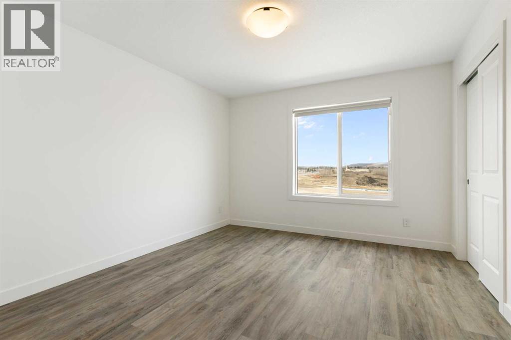 102, 24 Rivercrest Drive, Cochrane, Alberta  T4C 2C5 - Photo 31 - A2302535