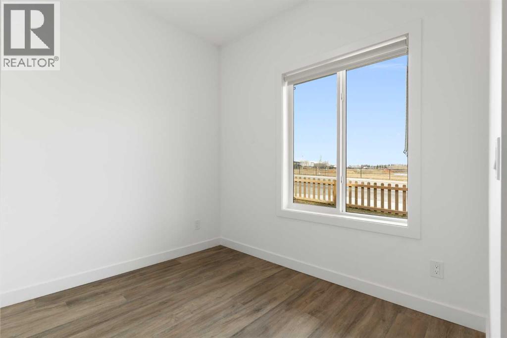 102, 24 Rivercrest Drive, Cochrane, Alberta  T4C 2C5 - Photo 9 - A2302535