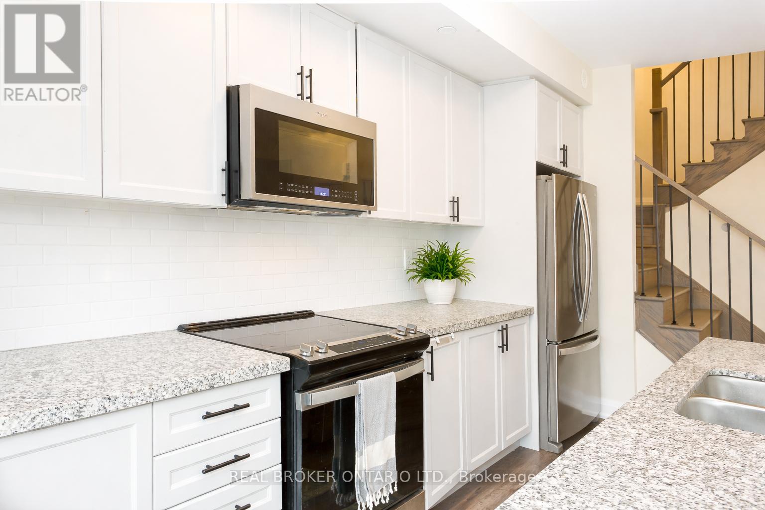 110 - 1593 Rose Way, Milton, Ontario  L9E 0J2 - Photo 2 - W13008068