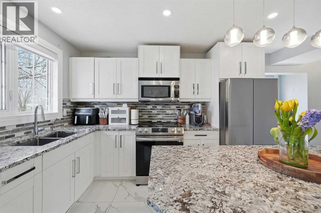 72 Abberfield Court NE, Calgary, Alberta  T2A 7N4 - Photo 9 - A2301952