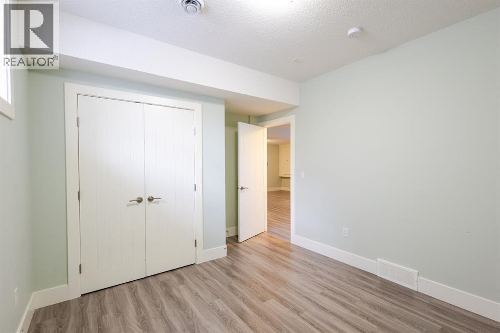 148 Baysprings Court SW, Airdrie, Alberta  T4B 3X7 - Photo 30 - A2299469