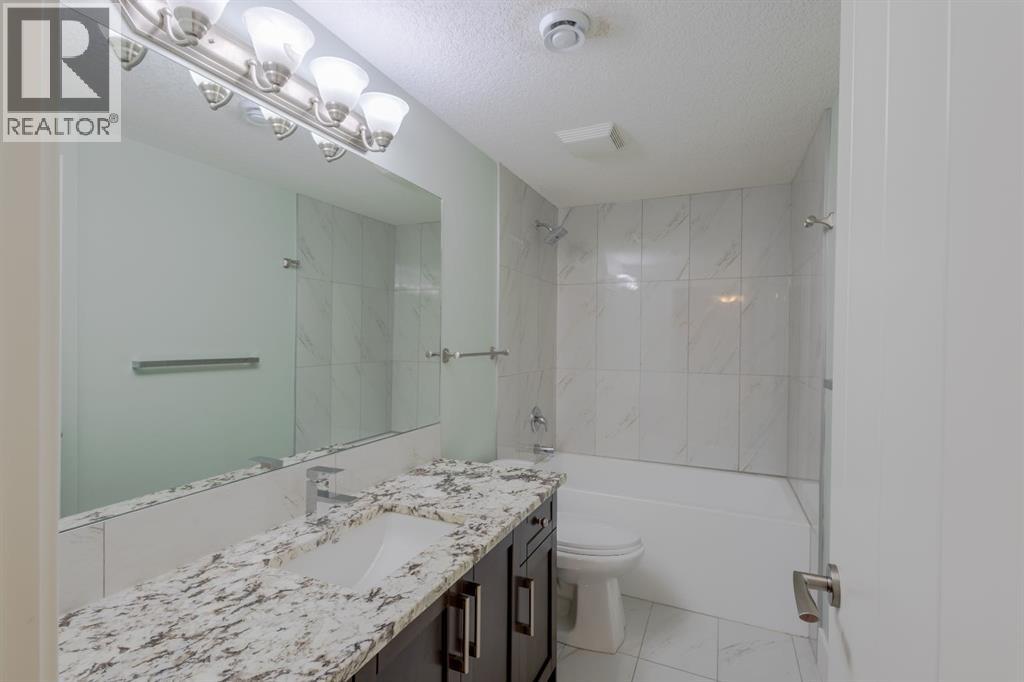 148 Baysprings Court SW, Airdrie, Alberta  T4B 3X7 - Photo 28 - A2299469