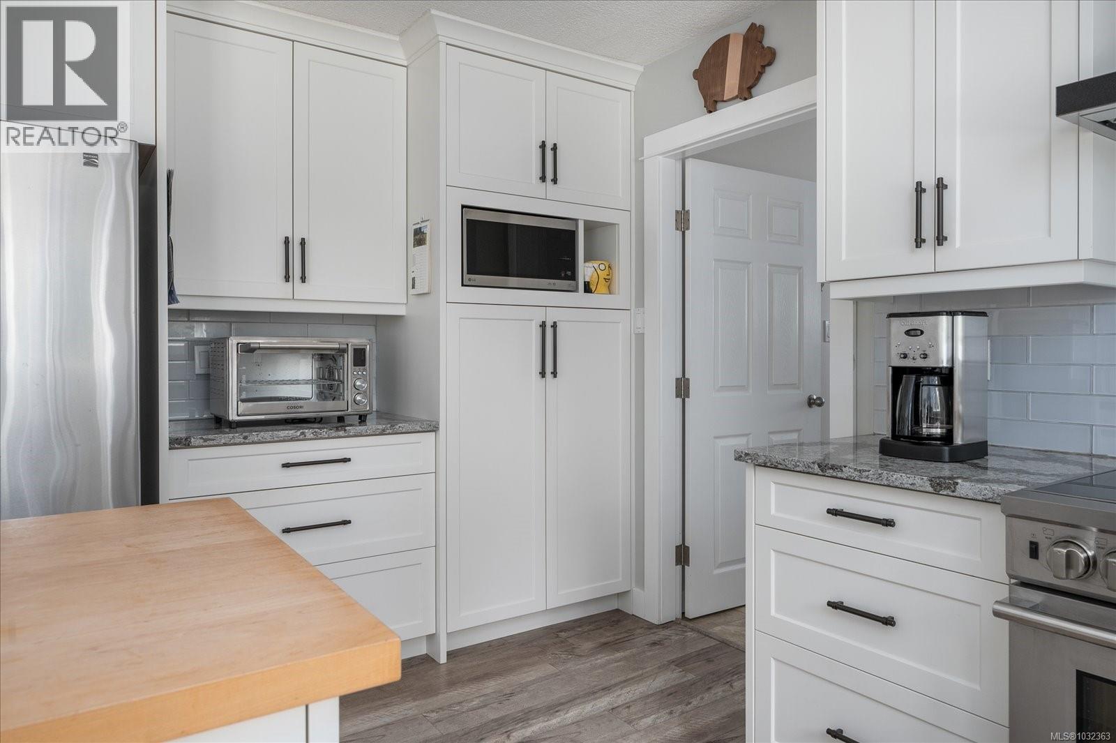 1156 Clubhouse Dr, Qualicum Beach, British Columbia  V9K 1C4 - Photo 4 - 1032363