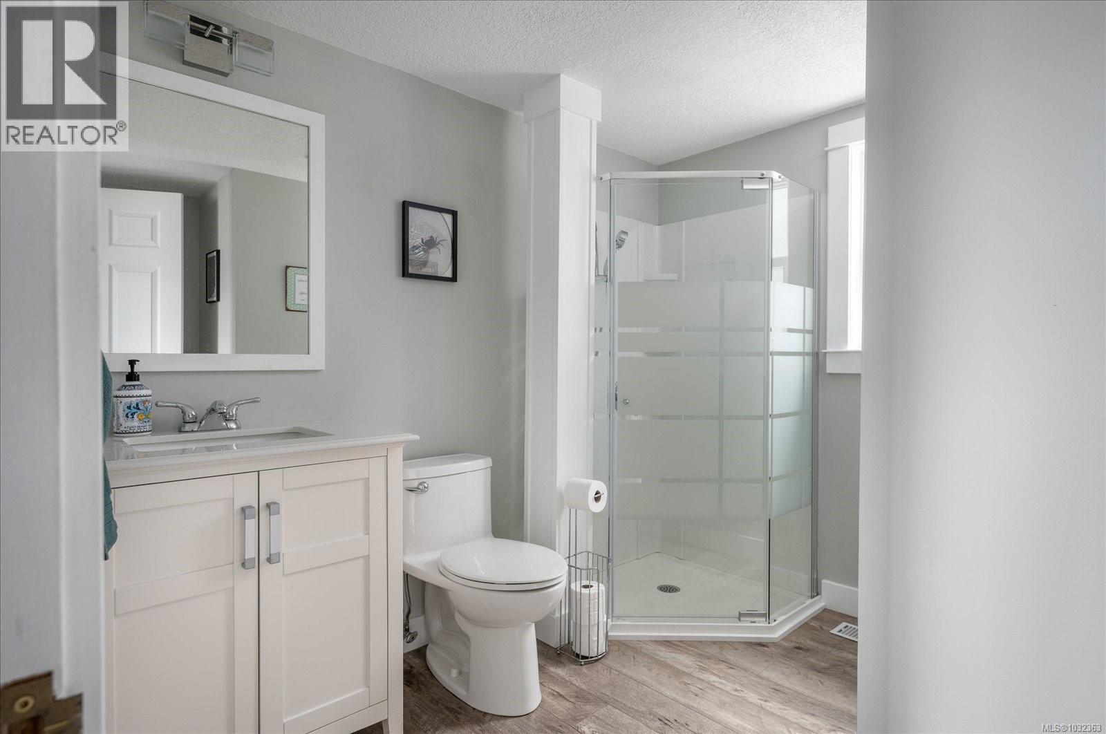 1156 Clubhouse Dr, Qualicum Beach, British Columbia  V9K 1C4 - Photo 9 - 1032363