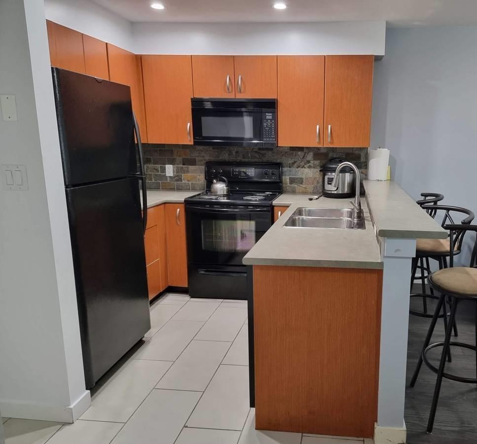 211 20750 Duncan Way, Langley, British Columbia  V3A 9J6 - Photo 1 - R3112409