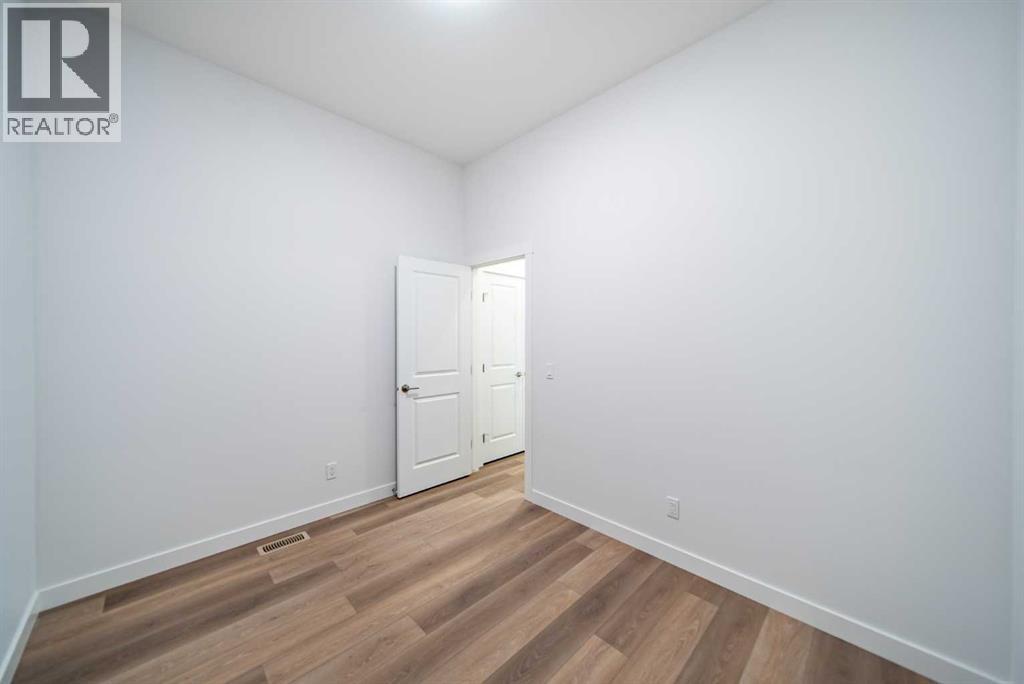 73 Royston Grove Nw, Calgary, Alberta  T3L 0M3 - Photo 13 - A2291753