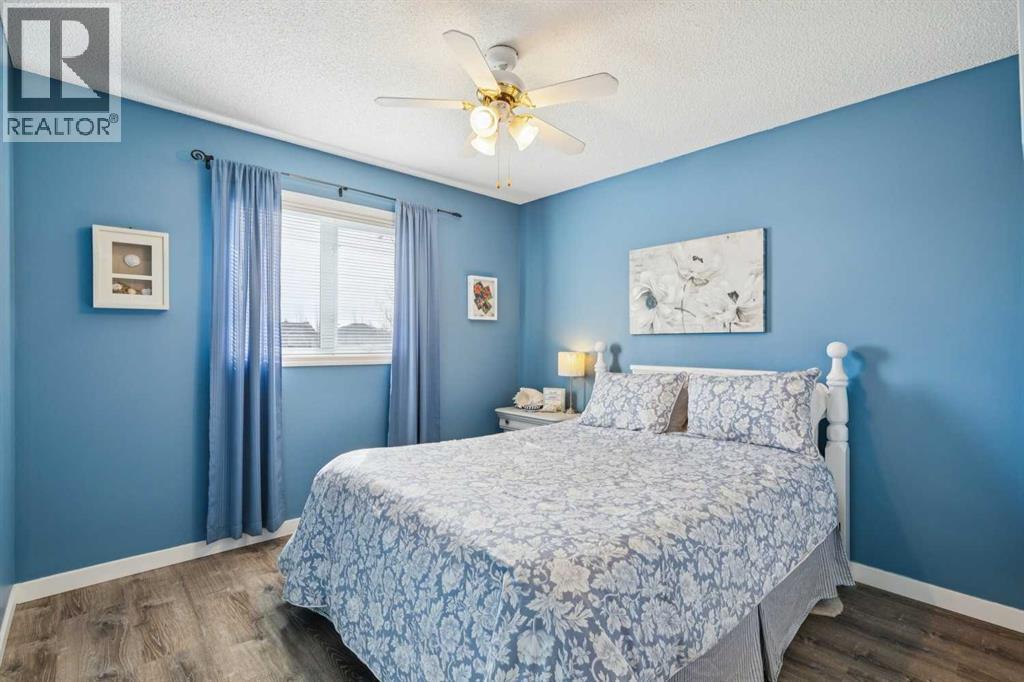 420 Rocky Ridge Bay Nw, Calgary, Alberta  T3G 4H8 - Photo 35 - A2296012