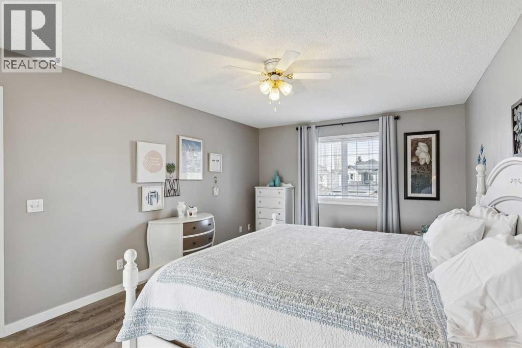 420 Rocky Ridge Bay Nw, Calgary, Alberta  T3G 4H8 - Photo 26 - A2296012