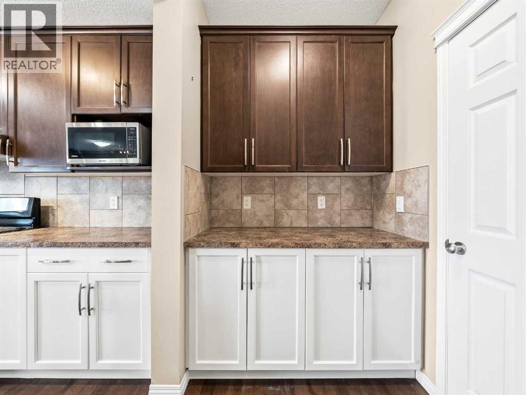 32 Panatella Parade Nw, Calgary, Alberta  T3K 0T8 - Photo 7 - A2302640