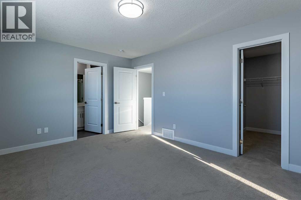 7 Heritage Point, Cochrane, Alberta  T4C 3K7 - Photo 16 - A2291321