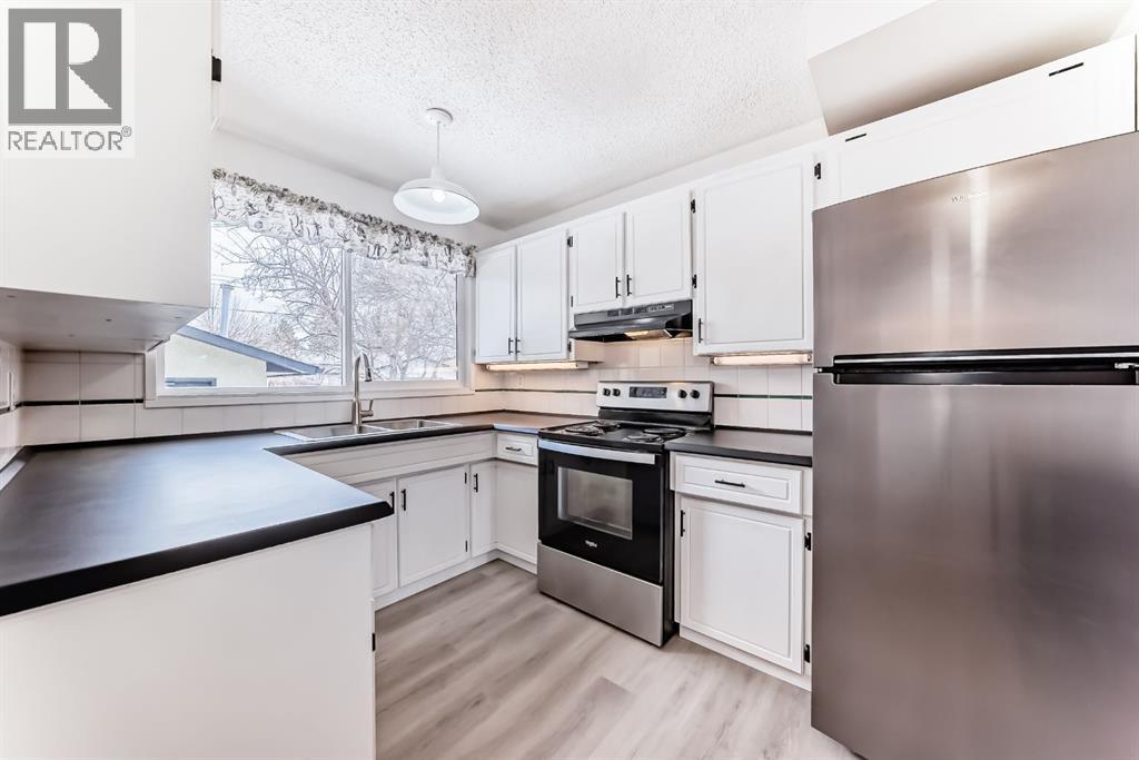 1277 Lake Sylvan Drive SE, Calgary, Alberta  T1J 3E2 - Photo 5 - A2299778