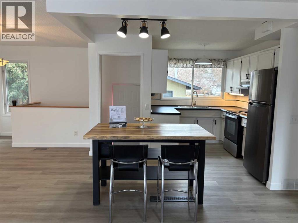 1277 Lake Sylvan Drive SE, Calgary, Alberta  T1J 3E2 - Photo 2 - A2299778