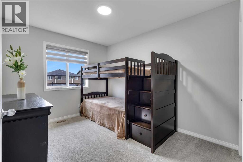 246 Midgrove Mews Sw, Airdrie, Alberta  T4B 5K8 - Photo 24 - A2300657