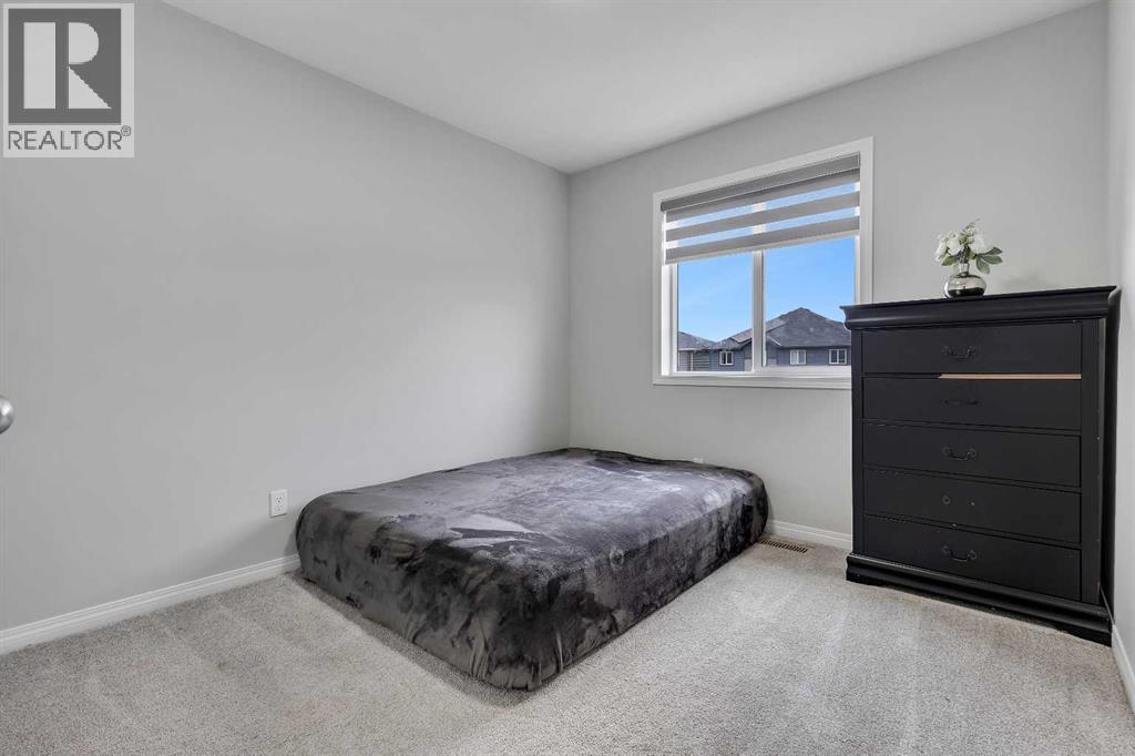 246 Midgrove Mews Sw, Airdrie, Alberta  T4B 5K8 - Photo 26 - A2300657