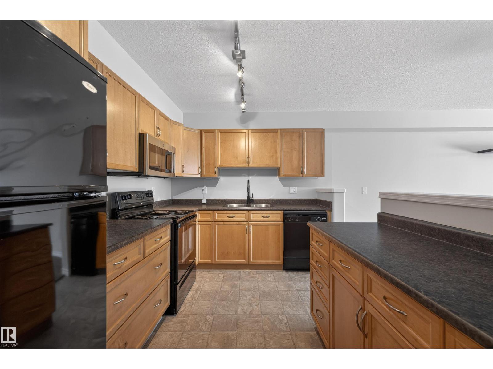 #102 1589 Glastonbury Bv Nw, Edmonton, Alberta  T5T 2V1 - Photo 3 - E4476301