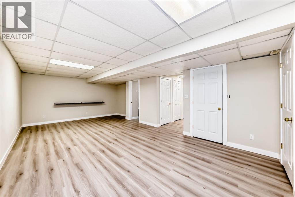 311 Rocky Ridge Cove Nw, Calgary, Alberta  T3G 4K1 - Photo 32 - A2300845