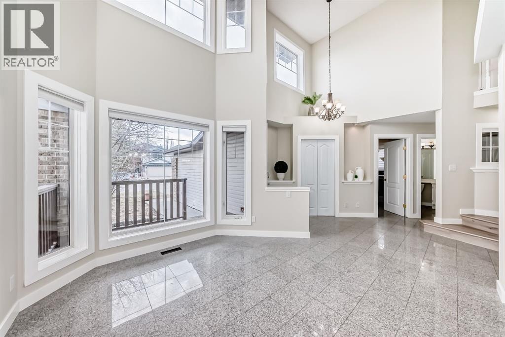 311 Rocky Ridge Cove Nw, Calgary, Alberta  T3G 4K1 - Photo 5 - A2300845