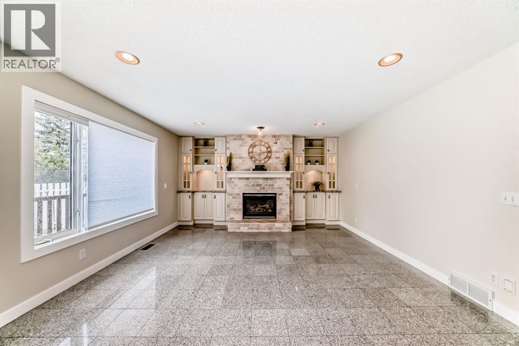 311 Rocky Ridge Cove Nw, Calgary, Alberta  T3G 4K1 - Photo 15 - A2300845