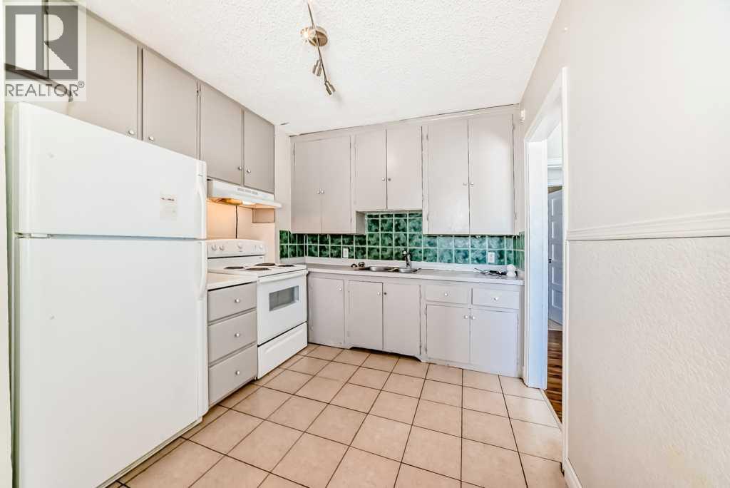 1610 40 Street SW, Calgary, Alberta  T3C 1W9 - Photo 5 - A2297012