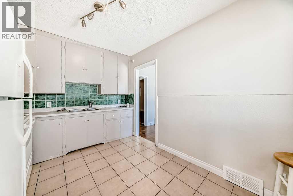 1610 40 Street SW, Calgary, Alberta  T3C 1W9 - Photo 6 - A2297012