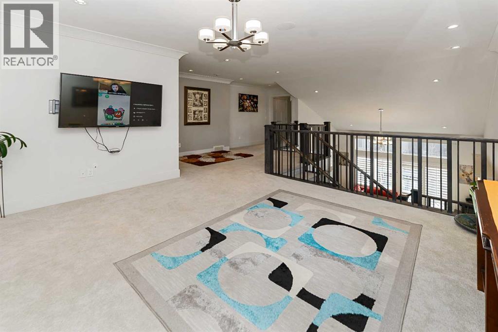 129 Kinniburgh Gardens, Chestermere, Alberta  T1X 0R7 - Photo 20 - A2301272