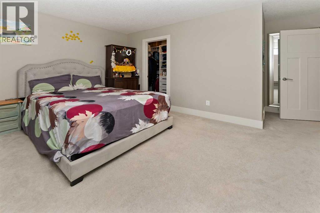 129 Kinniburgh Gardens, Chestermere, Alberta  T1X 0R7 - Photo 31 - A2301272