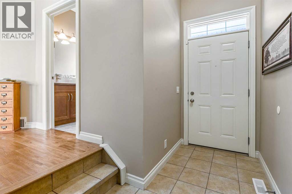 79 Tucker Circle, Okotoks, Alberta  T1S 2J7 - Photo 3 - A2298937