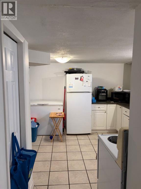 712 9 Avenue S, Lethbridge, Alberta  T1J 1T5 - Photo 9 - A2300993