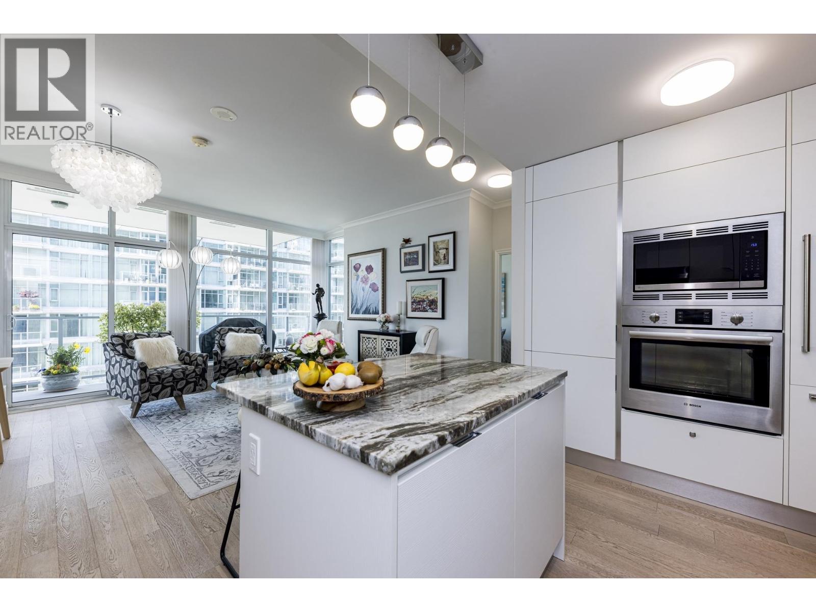 303 185 Victory Ship Way, North Vancouver, British Columbia  V7L 0G2 - Photo 2 - R3112461