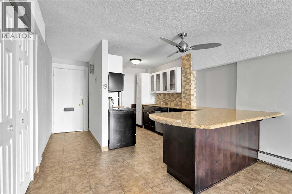 210, 519 17 Avenue Sw, Calgary, Alberta  T2S 0A9 - Photo 3 - A2295437