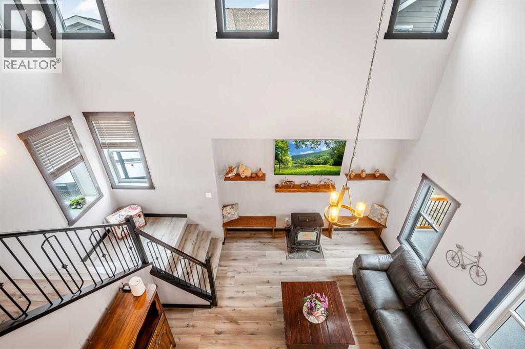 216 Cottageclub Crescent, Rural Rocky View County, Alberta  T4C 1B1 - Photo 10 - A2302814