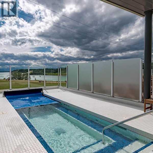 216 Cottageclub Crescent, Rural Rocky View County, Alberta  T4C 1B1 - Photo 20 - A2302814