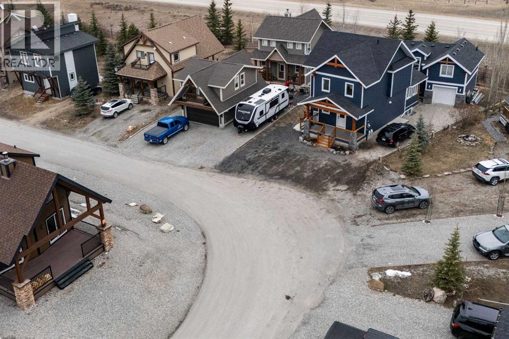 216 Cottageclub Crescent, Rural Rocky View County, Alberta  T4C 1B1 - Photo 5 - A2302814