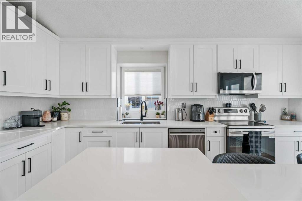 117 Rocky Ridge Landing Nw, Calgary, Alberta  t3g 4h5 - Photo 16 - A2293275