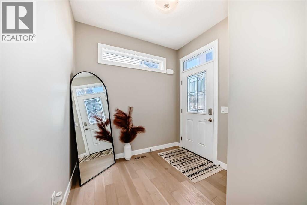 215 Kinniburgh Road, Chestermere, Alberta  T1X 0Y7 - Photo 4 - A2301342