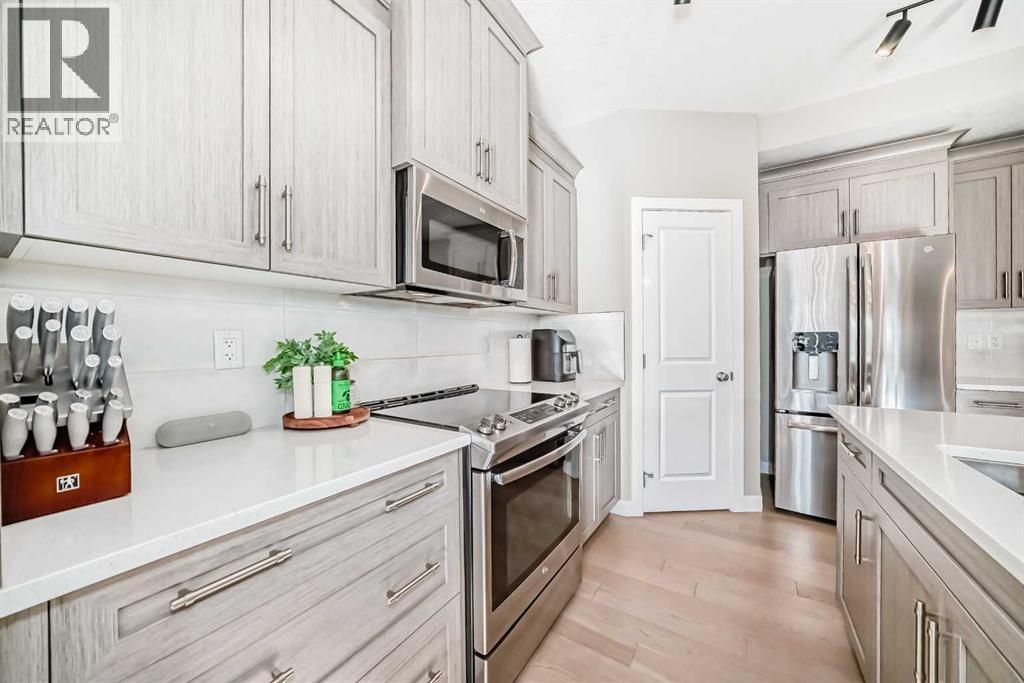 215 Kinniburgh Road, Chestermere, Alberta  T1X 0Y7 - Photo 7 - A2301342