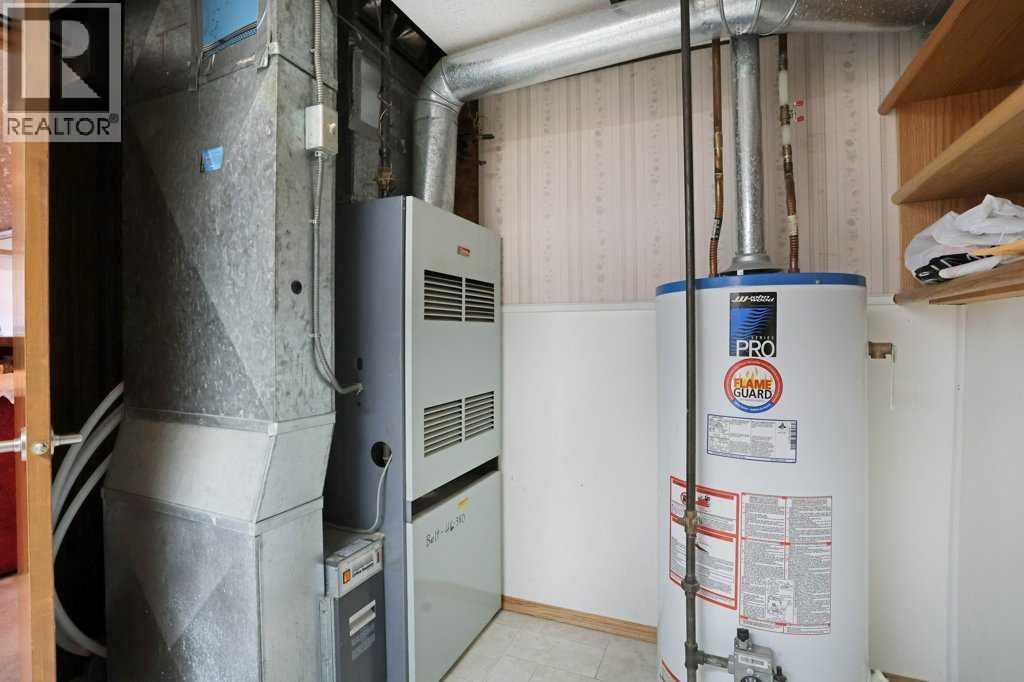 40 Chralesworth Crescent E, Brooks, Alberta  T1R 0H3 - Photo 37 - A2300054