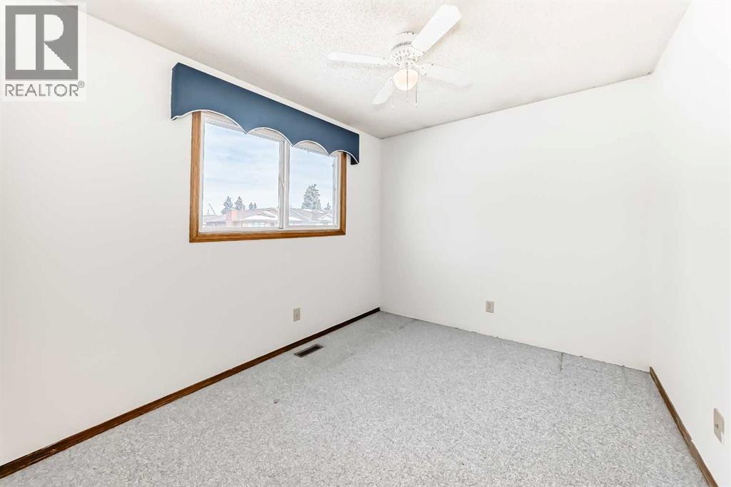 1837 Meadowbrook Drive SE, Airdrie, Alberta  T4A 1V5 - Photo 19 - A2287190