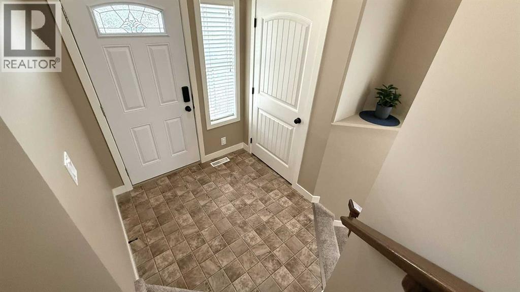 82 Harvest Close, Penhold, Alberta  T0M 1R0 - Photo 16 - A2302008