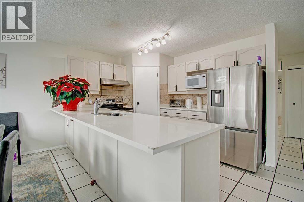 10316 Hidden Valley Drive Nw, Calgary, Alberta  T3A 4Z6 - Photo 12 - A2301053