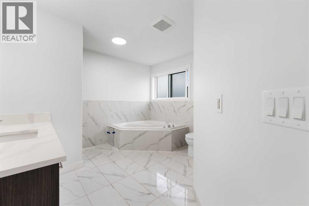 115 Taracove Landing Ne, Calgary, Alberta  T3J 4S7 - Photo 20 - A2269603