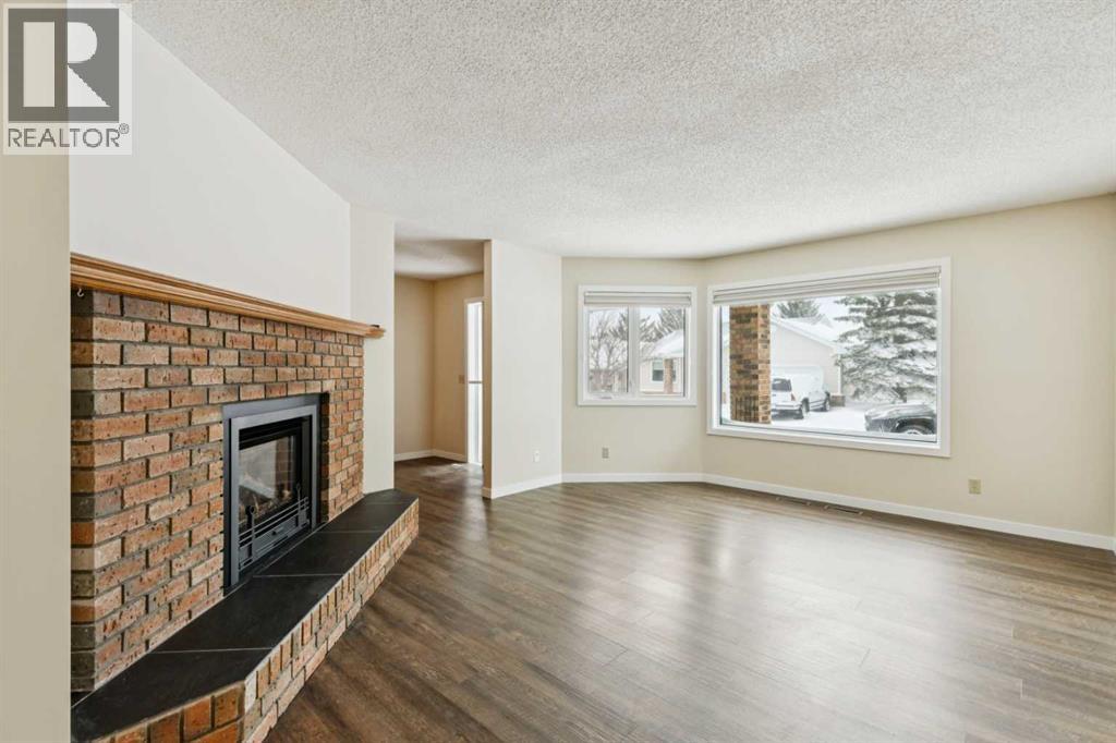 43 Macewan Park Heights Nw, Calgary, Alberta  T3K 3W6 - Photo 4 - A2302261