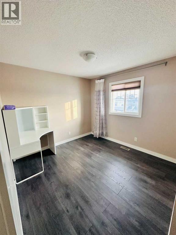 225 Panatella Square Nw, Calgary, Alberta  T3K 0V5 - Photo 6 - A2233986