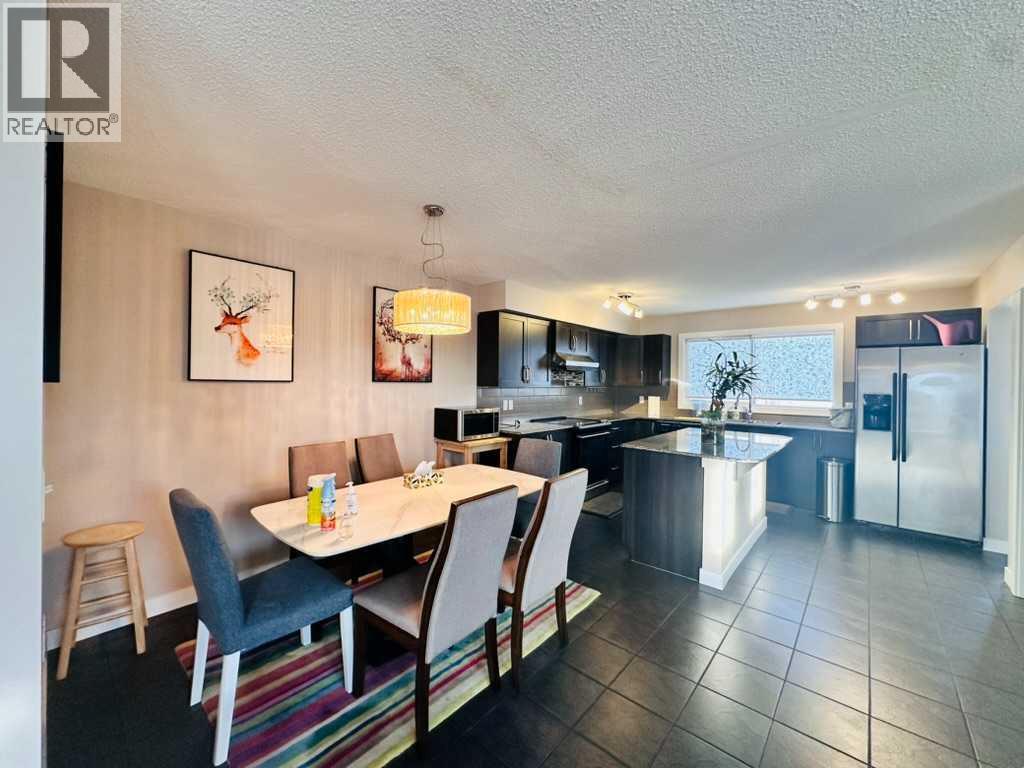 225 Panatella Square Nw, Calgary, Alberta  T3K 0V5 - Photo 3 - A2233986