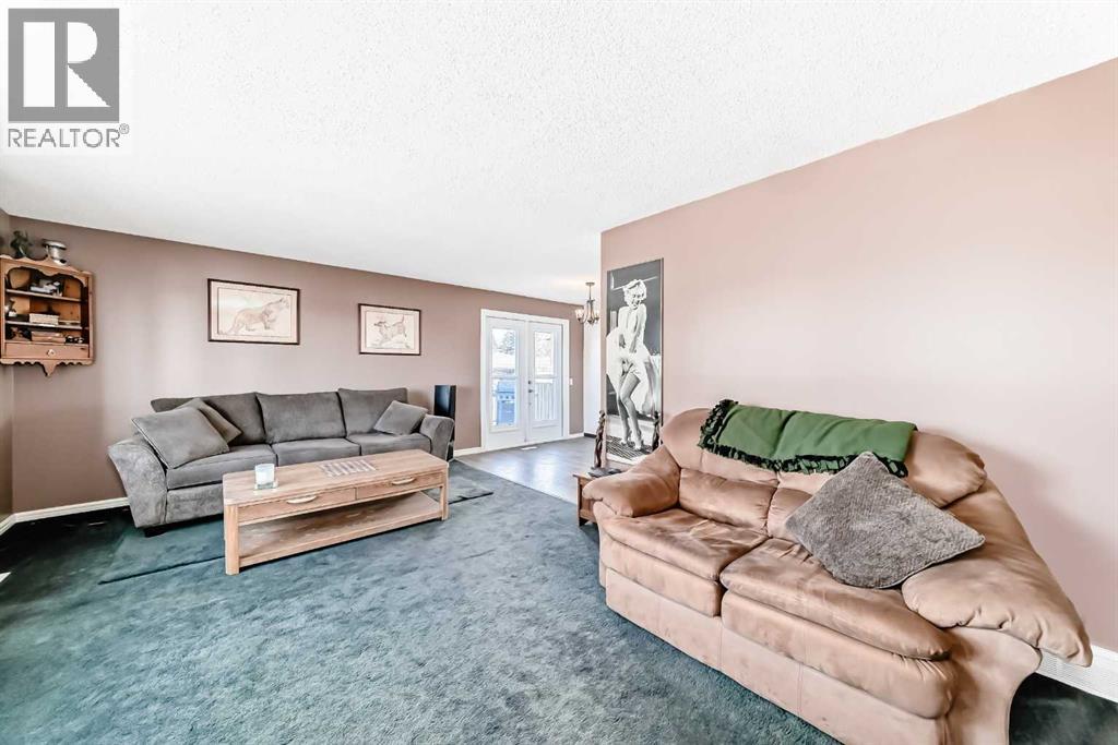 148 Huntridge Road Ne, Calgary, Alberta  T2k 4B5 - Photo 11 - A2294727