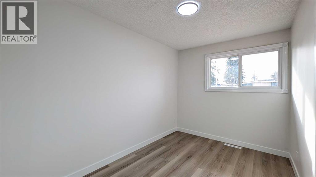 4 Harvey Place Sw, Calgary, Alberta  T2V 3A5 - Photo 15 - A2289807